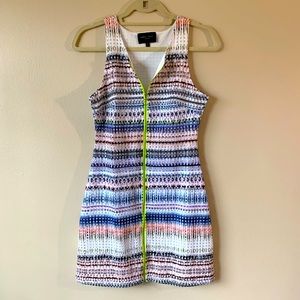 Sleeveless mini dress with a front zipper top to bottom
